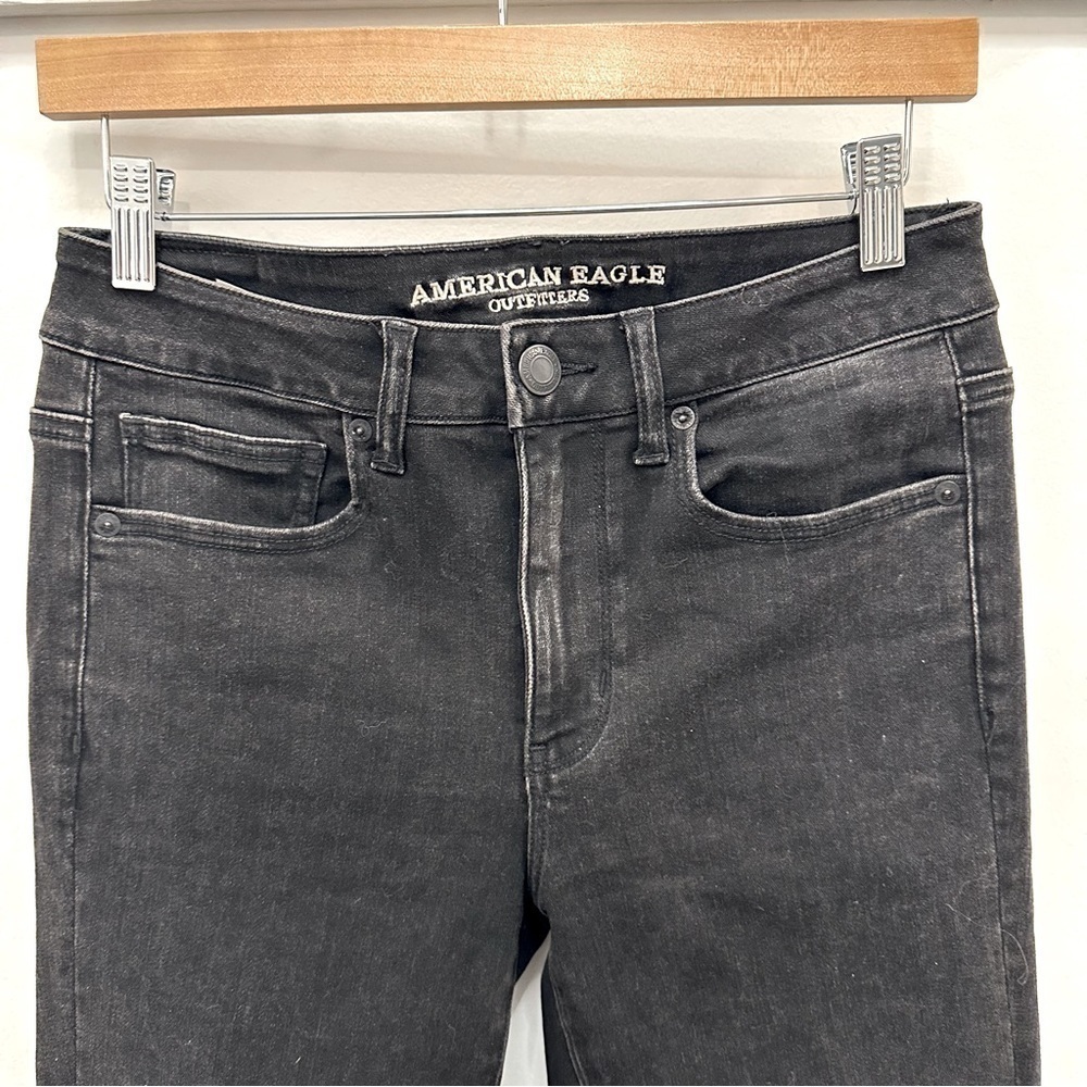 American eagle black jeans with cut hem